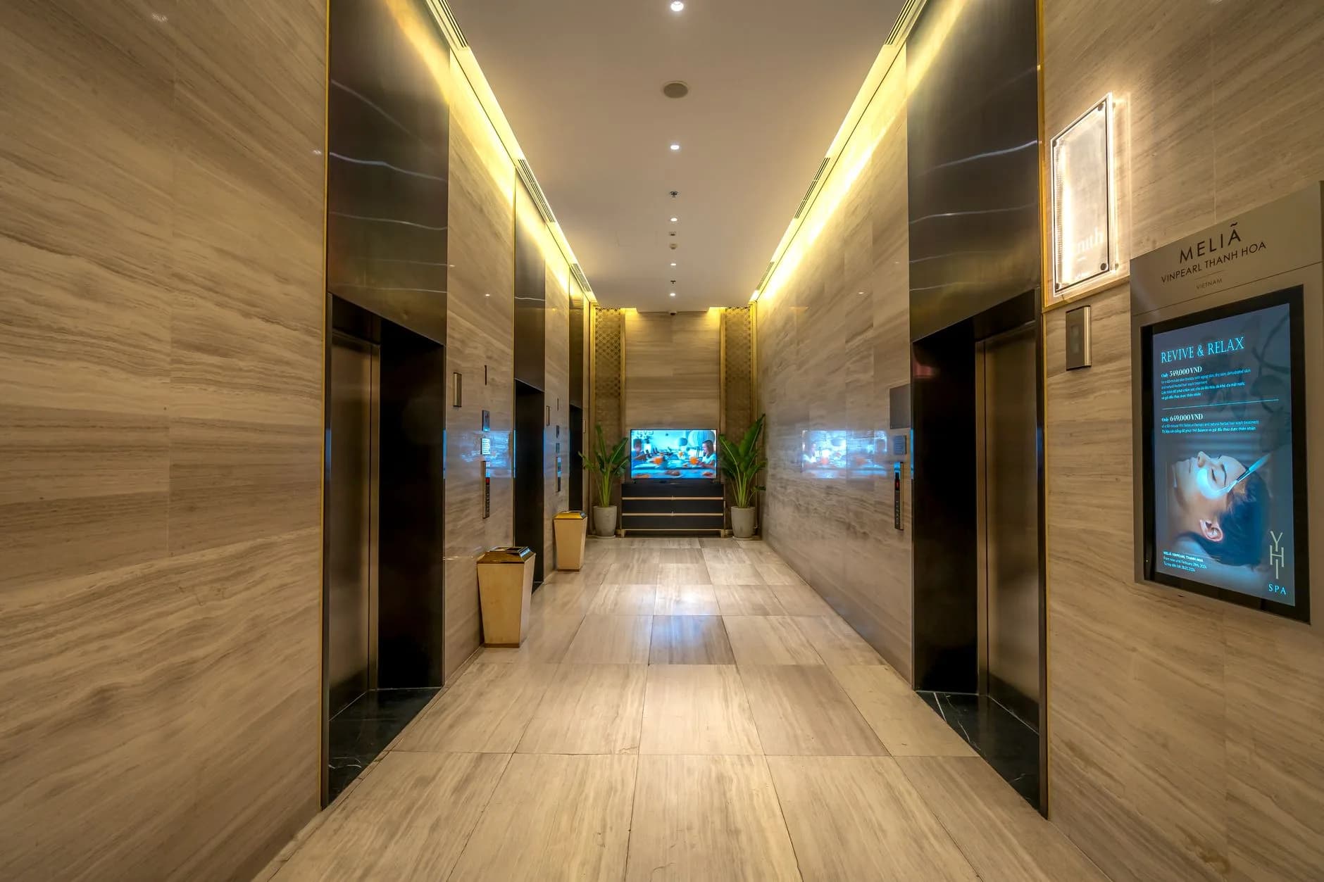 Hotel spa interior with warm stone textures and calm lighting