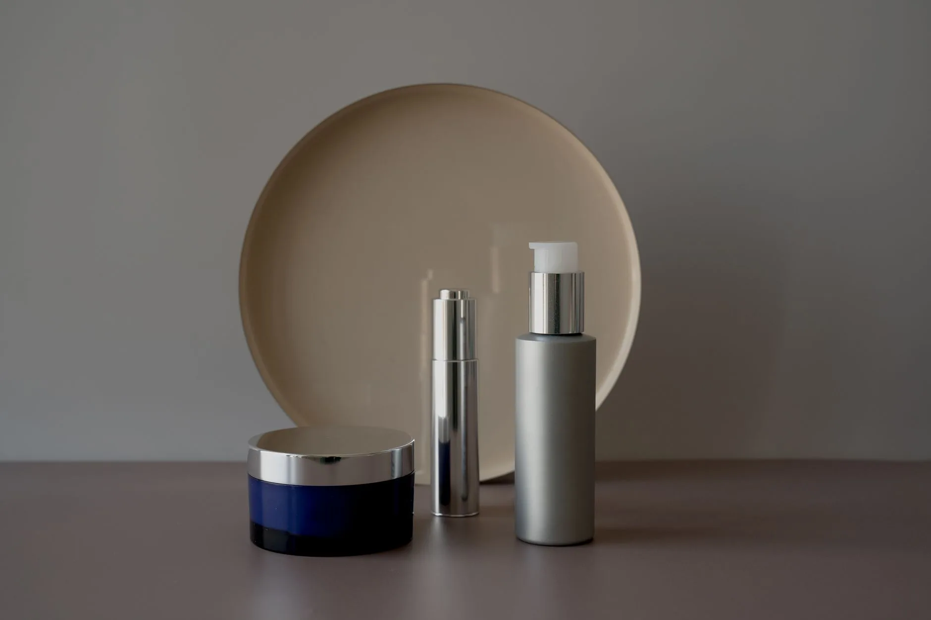 Natural skincare product range arranged on a soft background