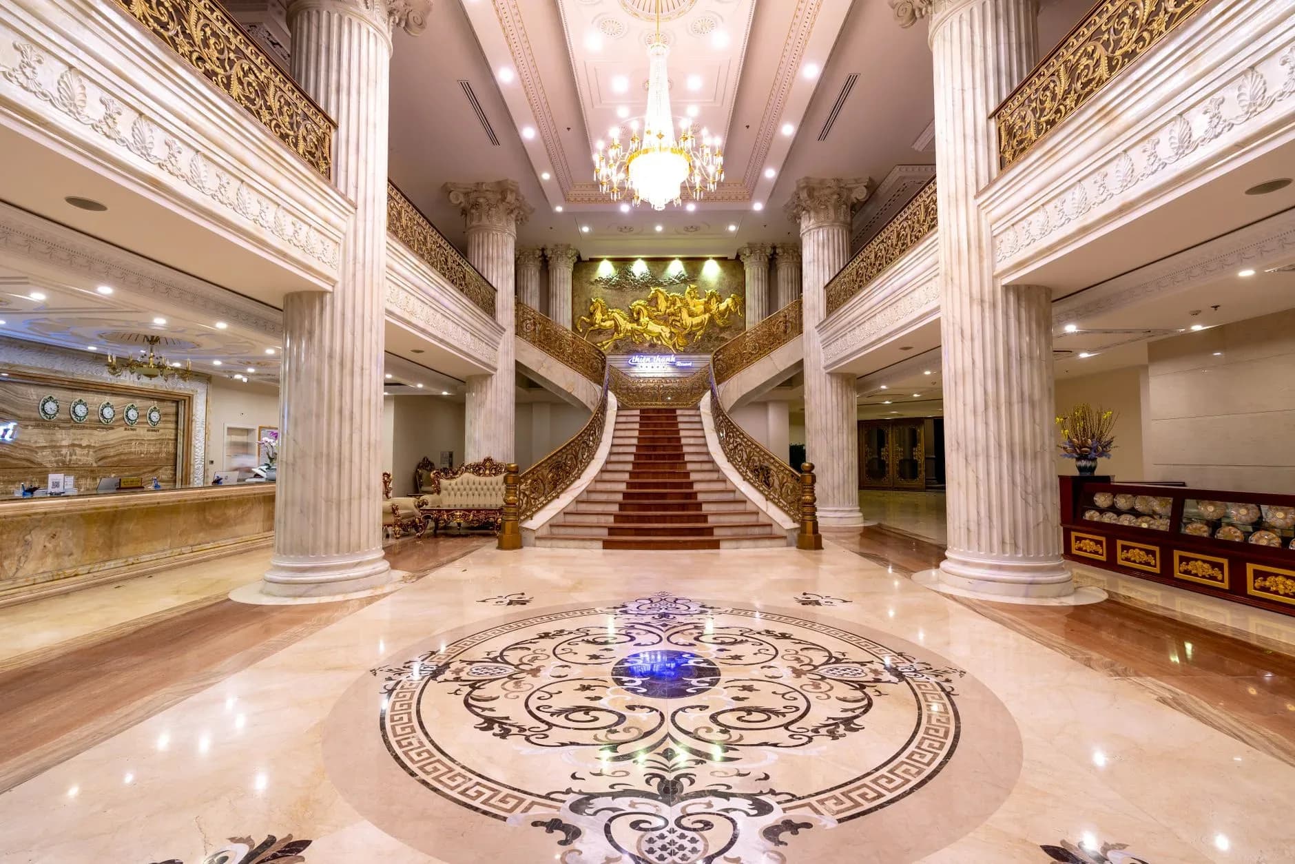 Luxury hotel lobby with sculptural seating and soft ambient light