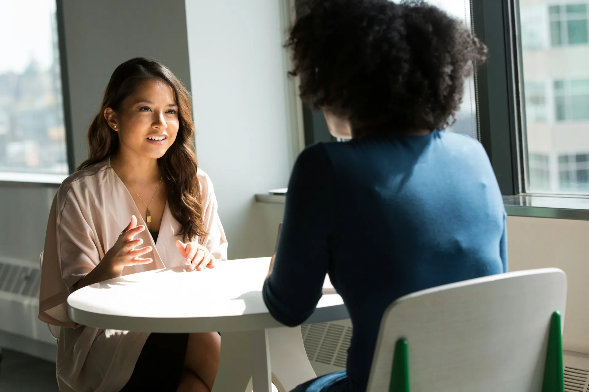 Therapist and client in a calm conversation room