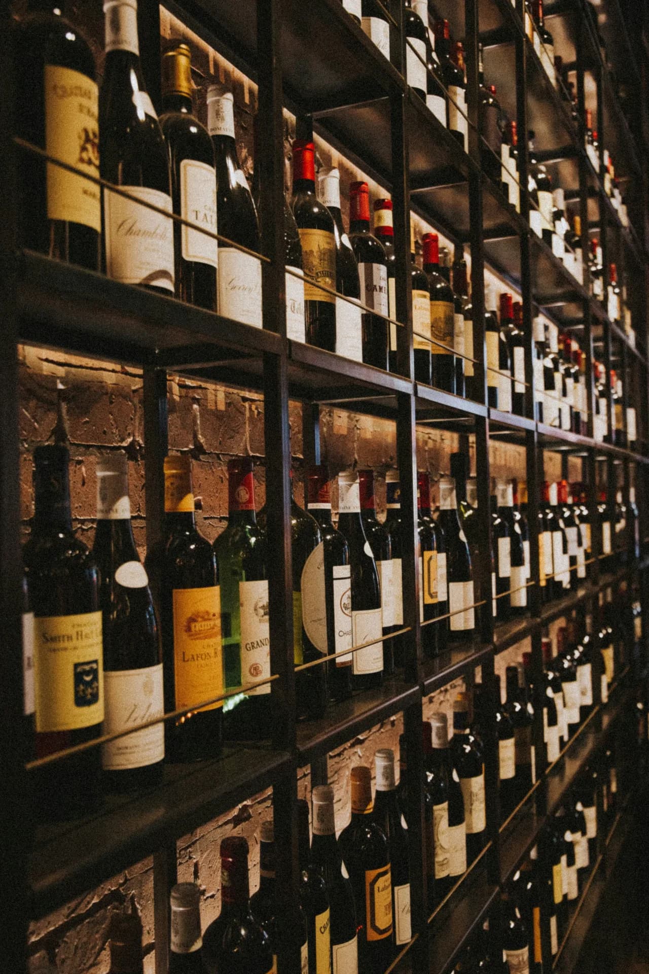 Wine shelves and a tasting room interior at an independent merchant