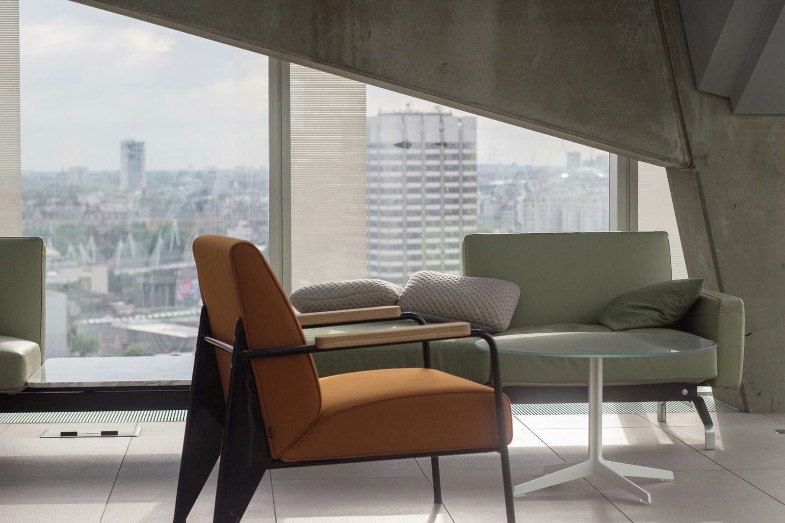 Warm therapy room with soft seating and natural light