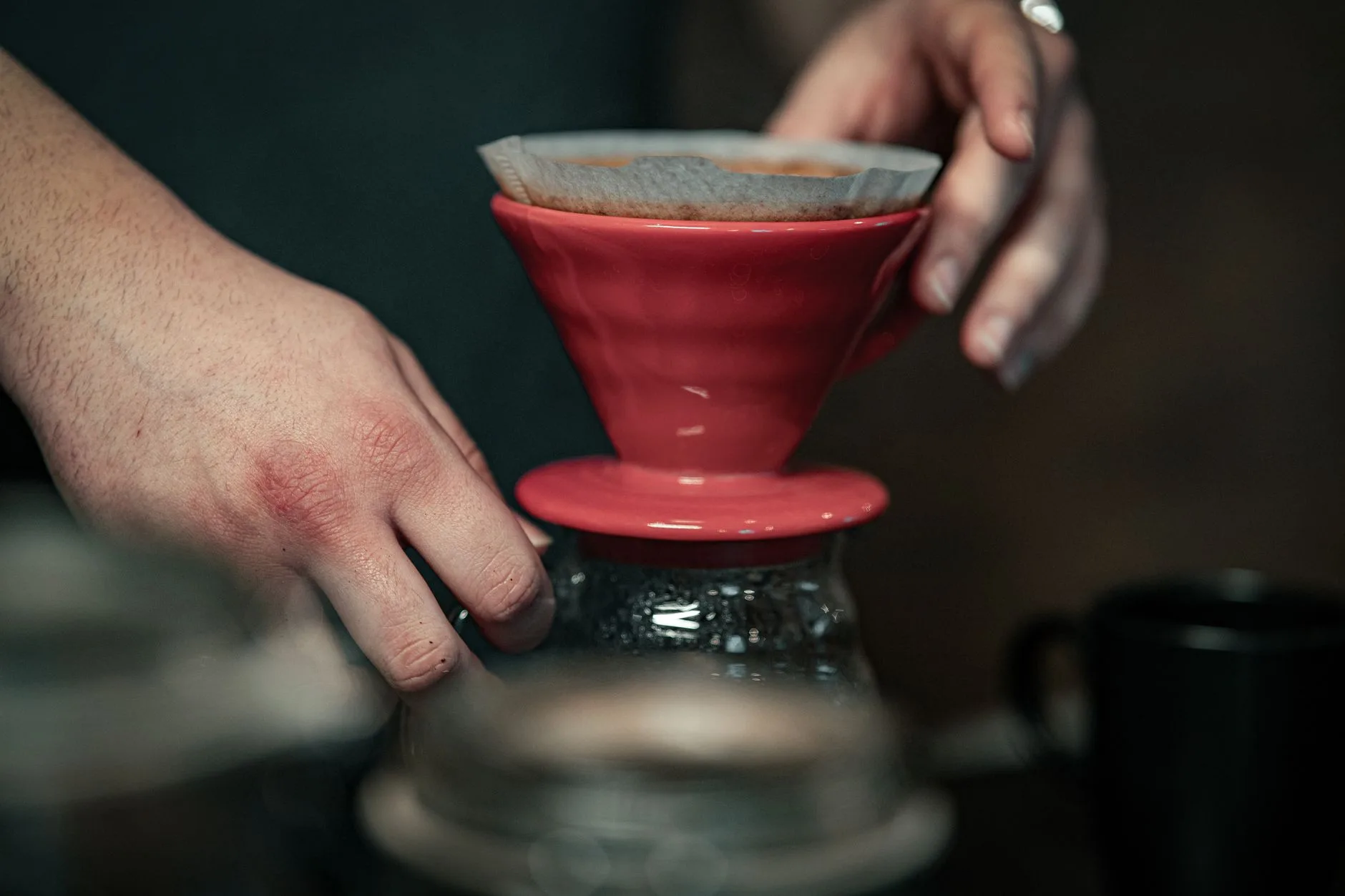 Brewing tools for making coffee at home alongside Kettle & Kin beans
