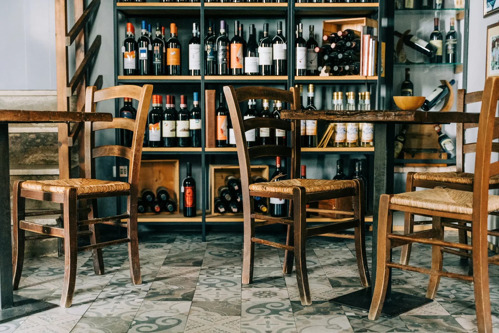 Wine glasses and bottles arranged on a tasting table