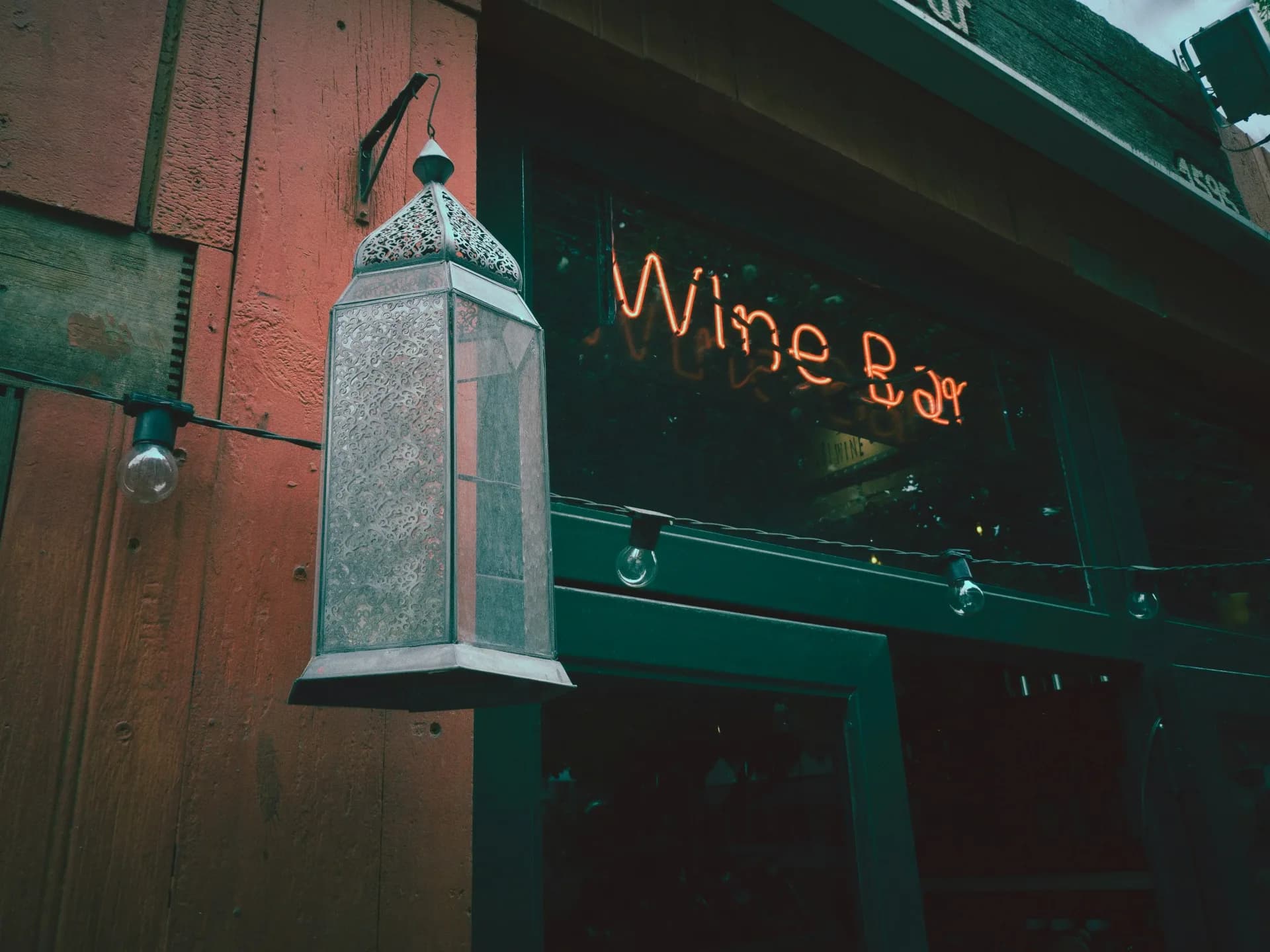 Warm exterior of a wine bar in York at dusk