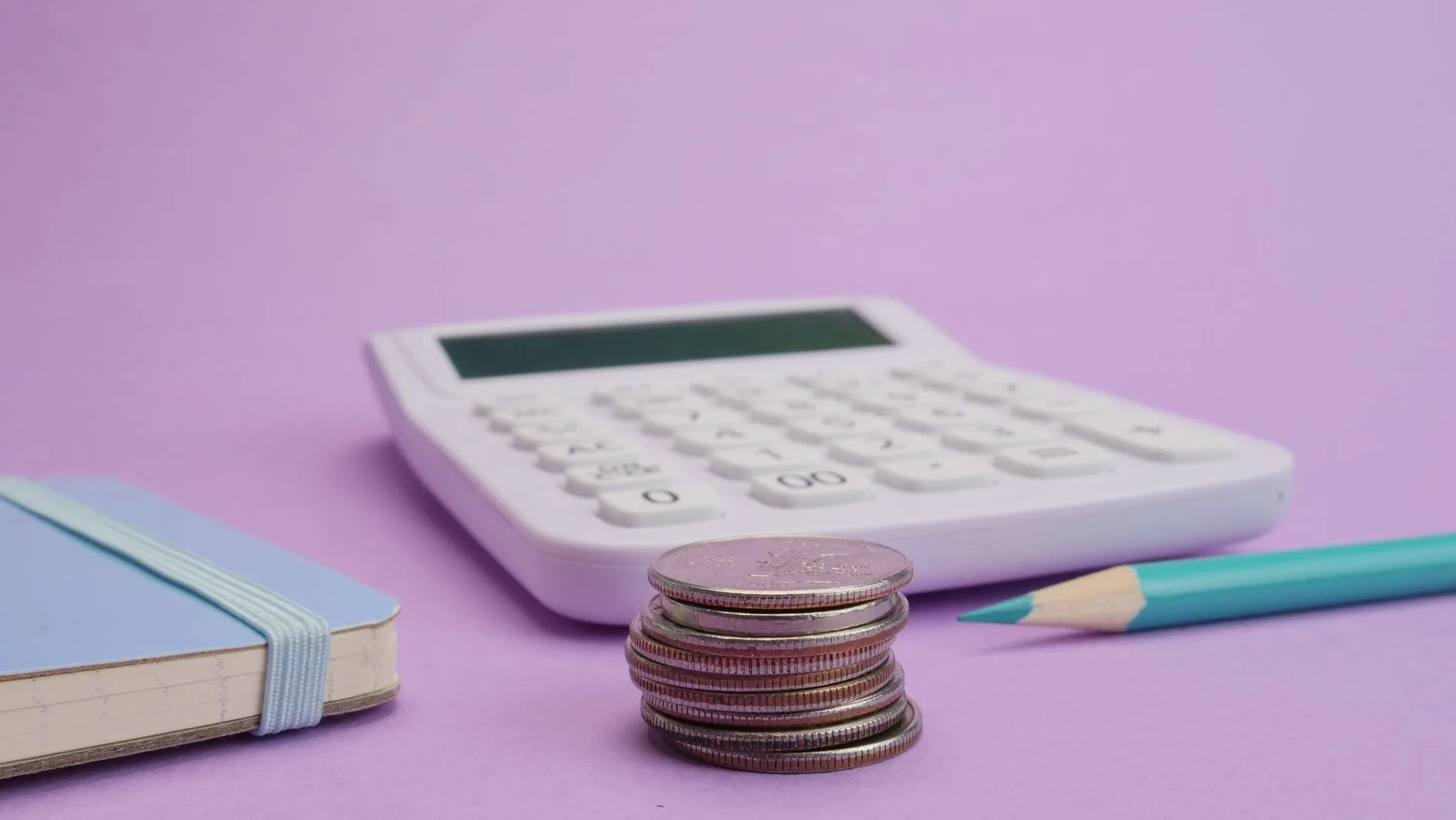 Financial planning documents and calculator on a desk