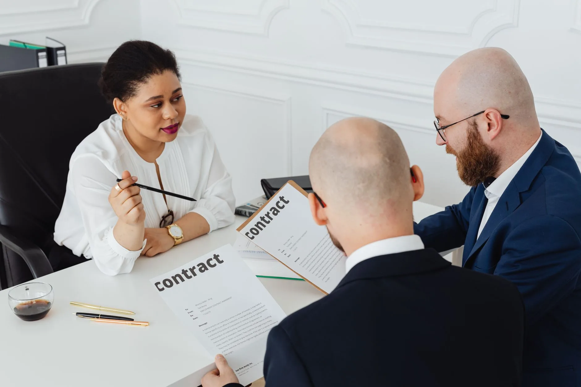 Contract review documents on a legal desk