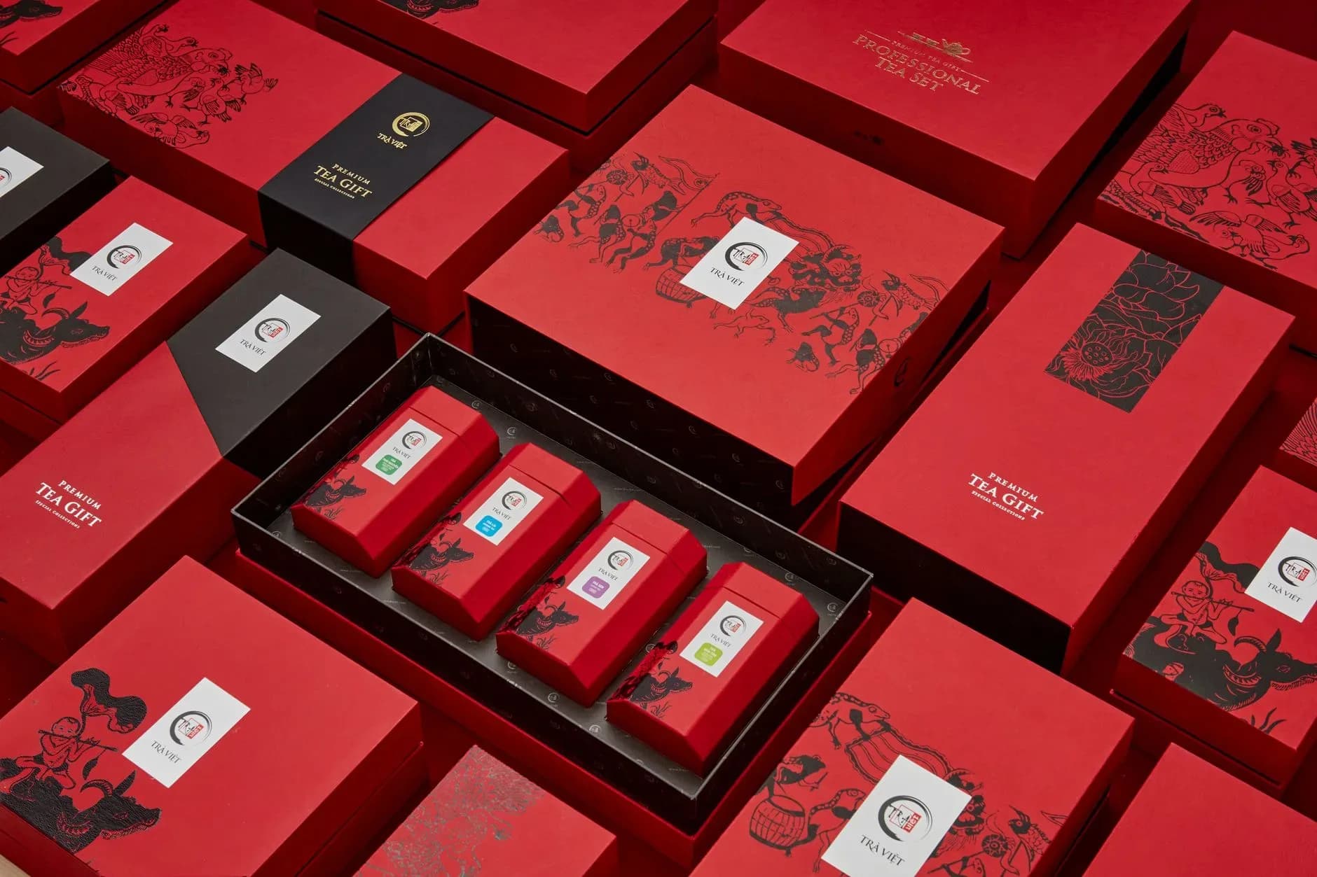 Premium organic green tea subscription box with tins, leaves, and tasting cards
