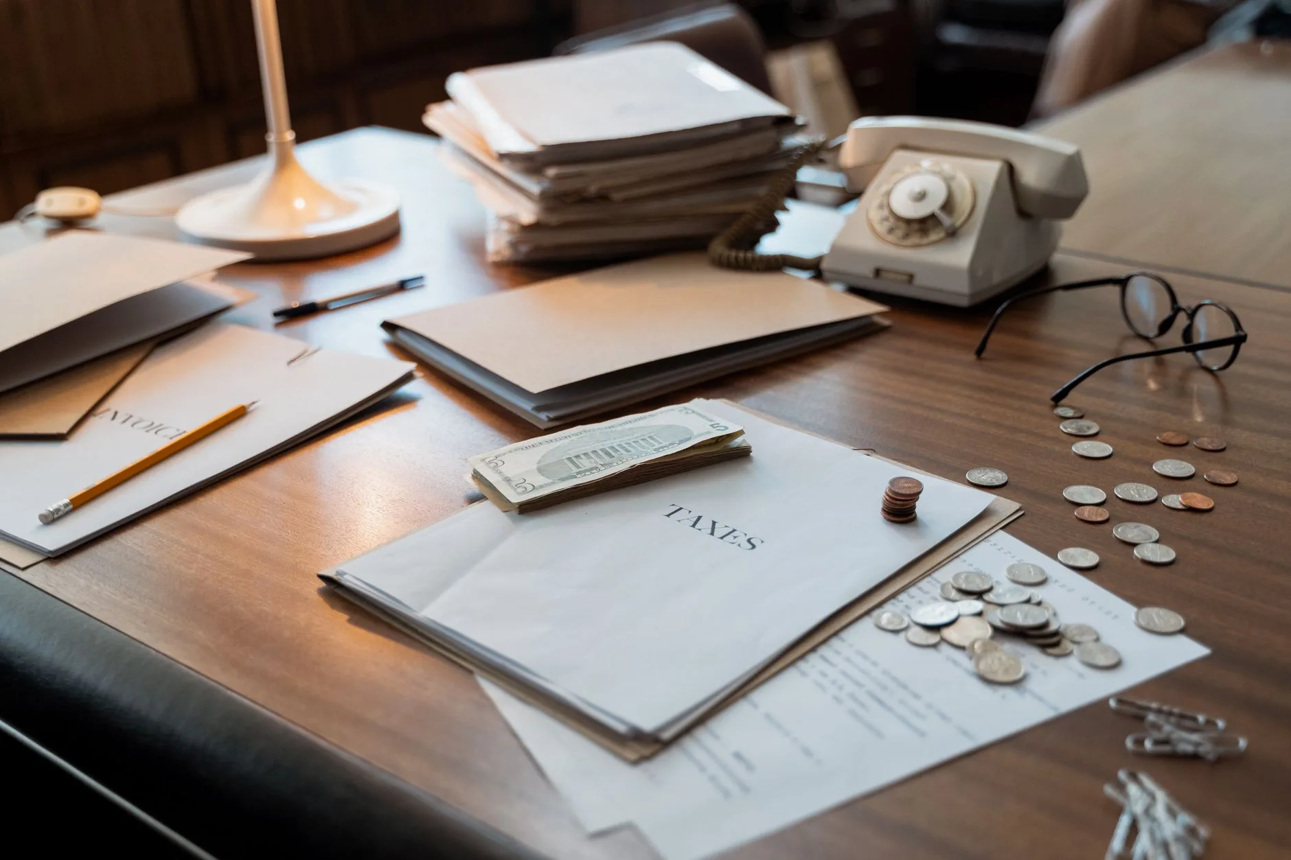 Tax documents and laptop used for compliance review