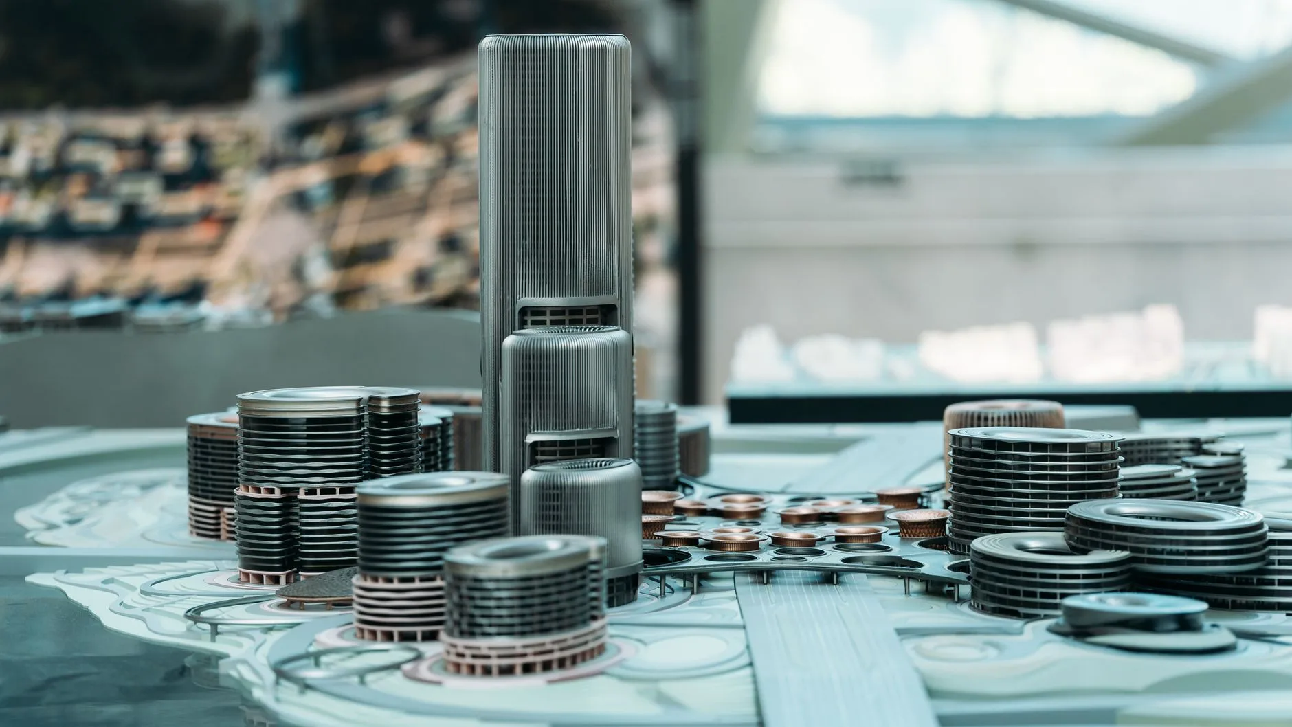 Architecture model and drawings arranged on a studio table