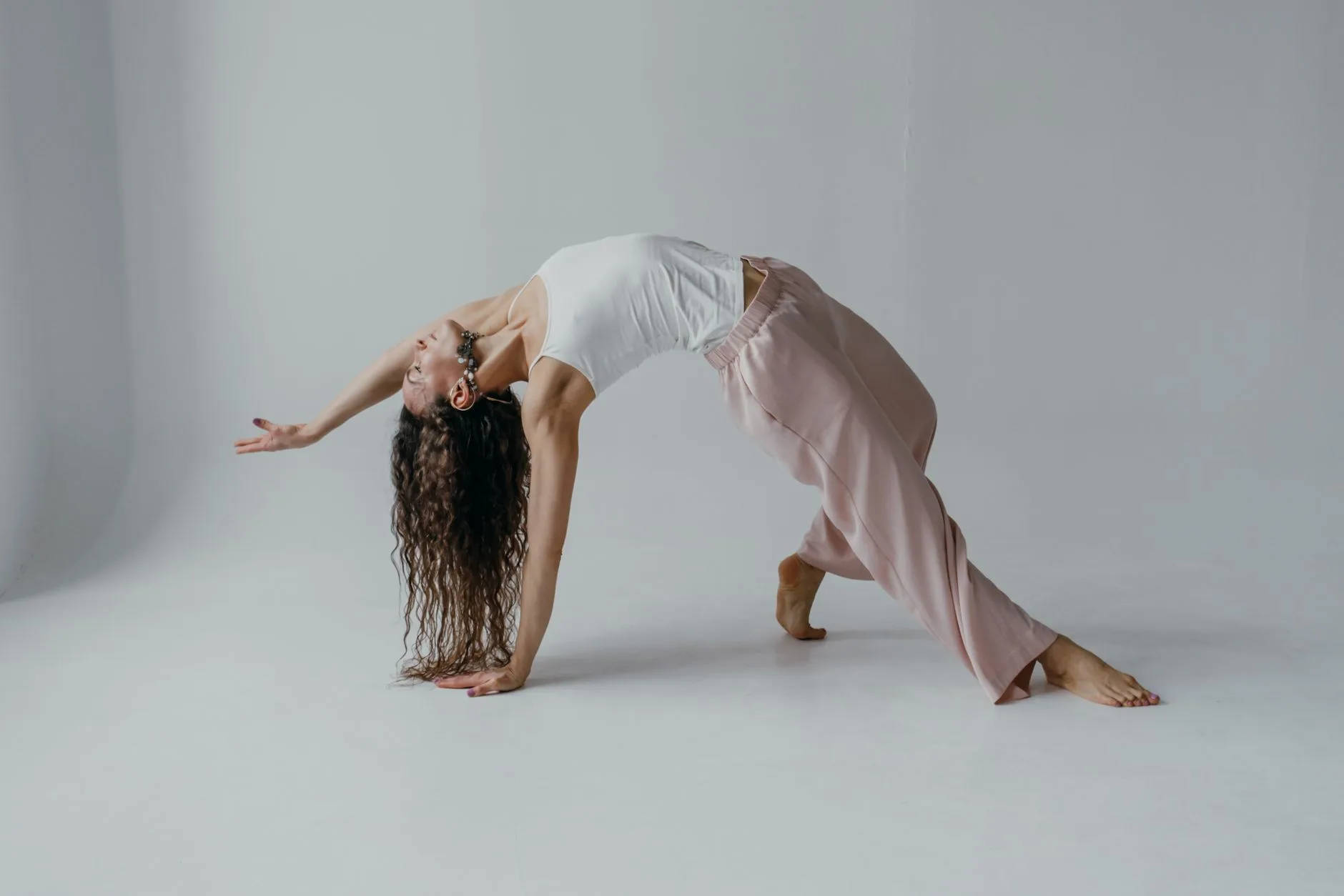 Person performing a yoga flow movement